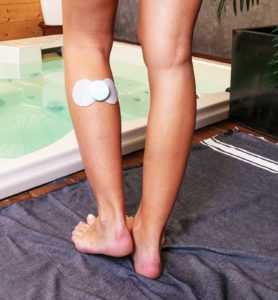 electrostimulateur anti douleur sur jambe pour retour veineux
